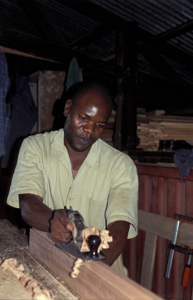 Woodworking in Uganda — Men at a ADRA training program in Uganda, learn carpentry skills that will enable them to find employment or start their own income g...