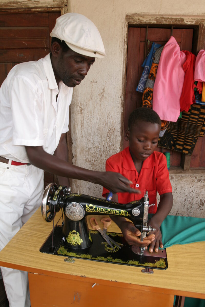 Learning to Sew in Malawi — Young man, orphaned by AIDS, benefits from an ADRA training program where he learns how to sew in Malawi — Malawi, Africa, ADRA, ...