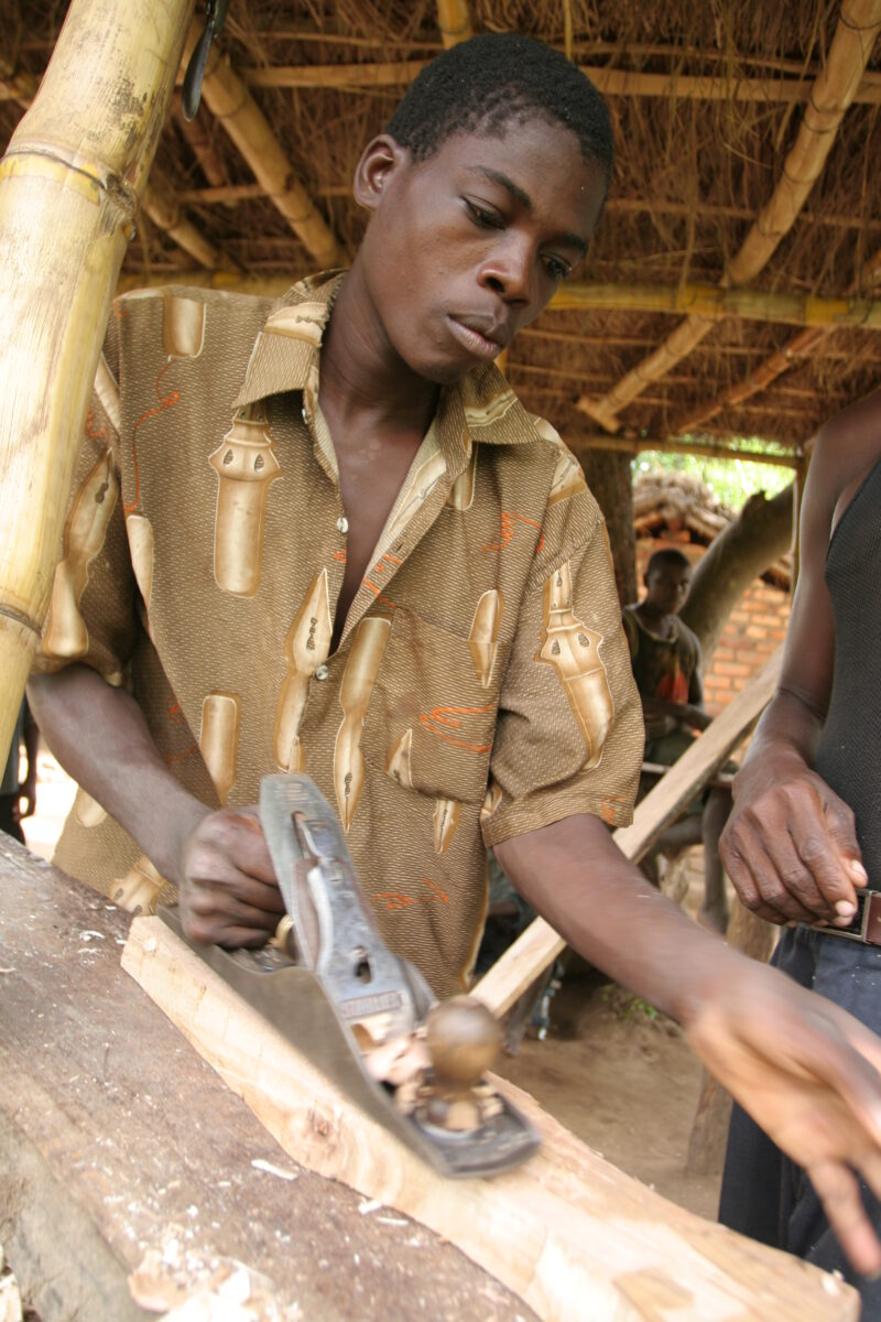 Learning Carpentry Skills in Malawi — Young man learns carpentry skills in a ADRA vocational training program in Malawi, Africa — Malawi, Africa, ADRA, skill...