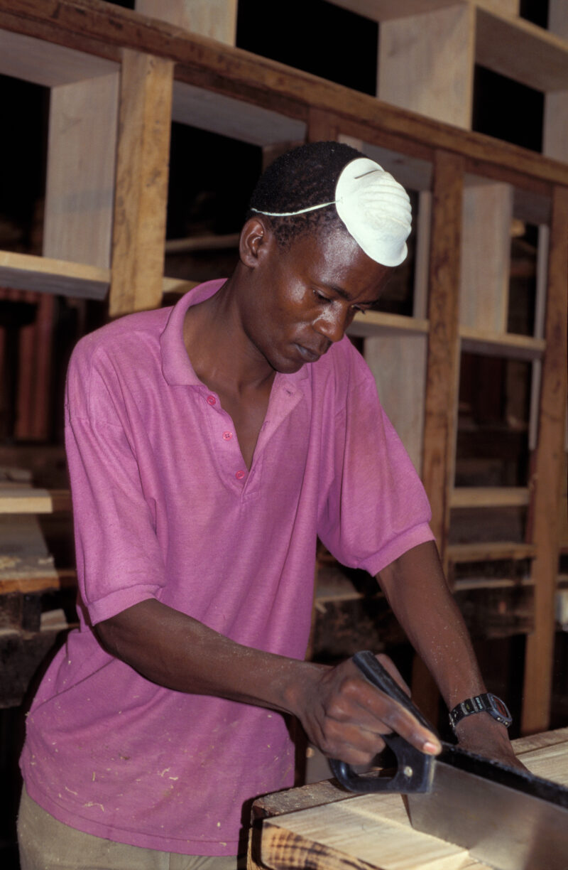 Woodworking in Uganda — Men at a ADRA training program in Uganda, learn carpentry skills that will enable them to find employment or start their own income g...