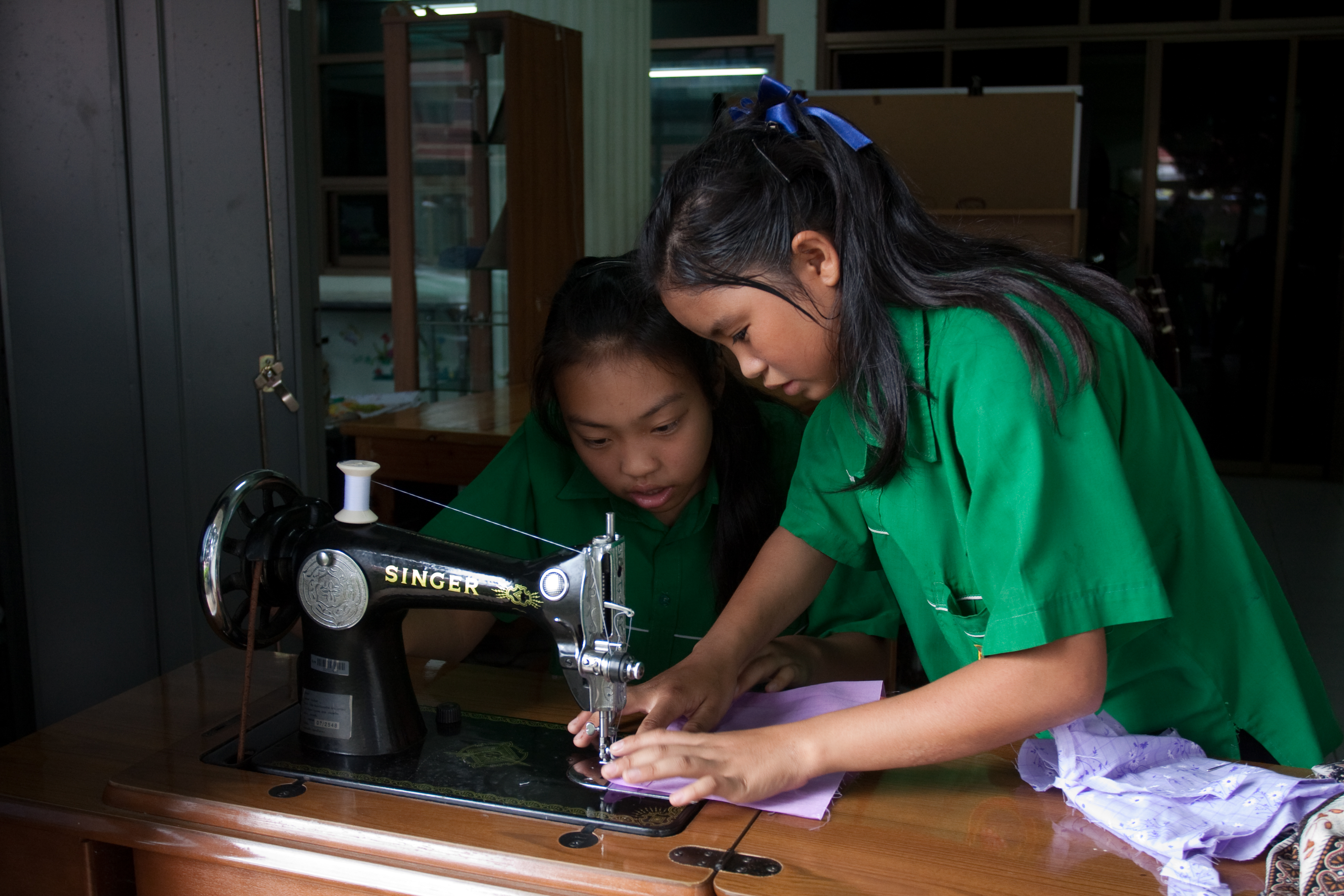 Learning to Sew in thailand