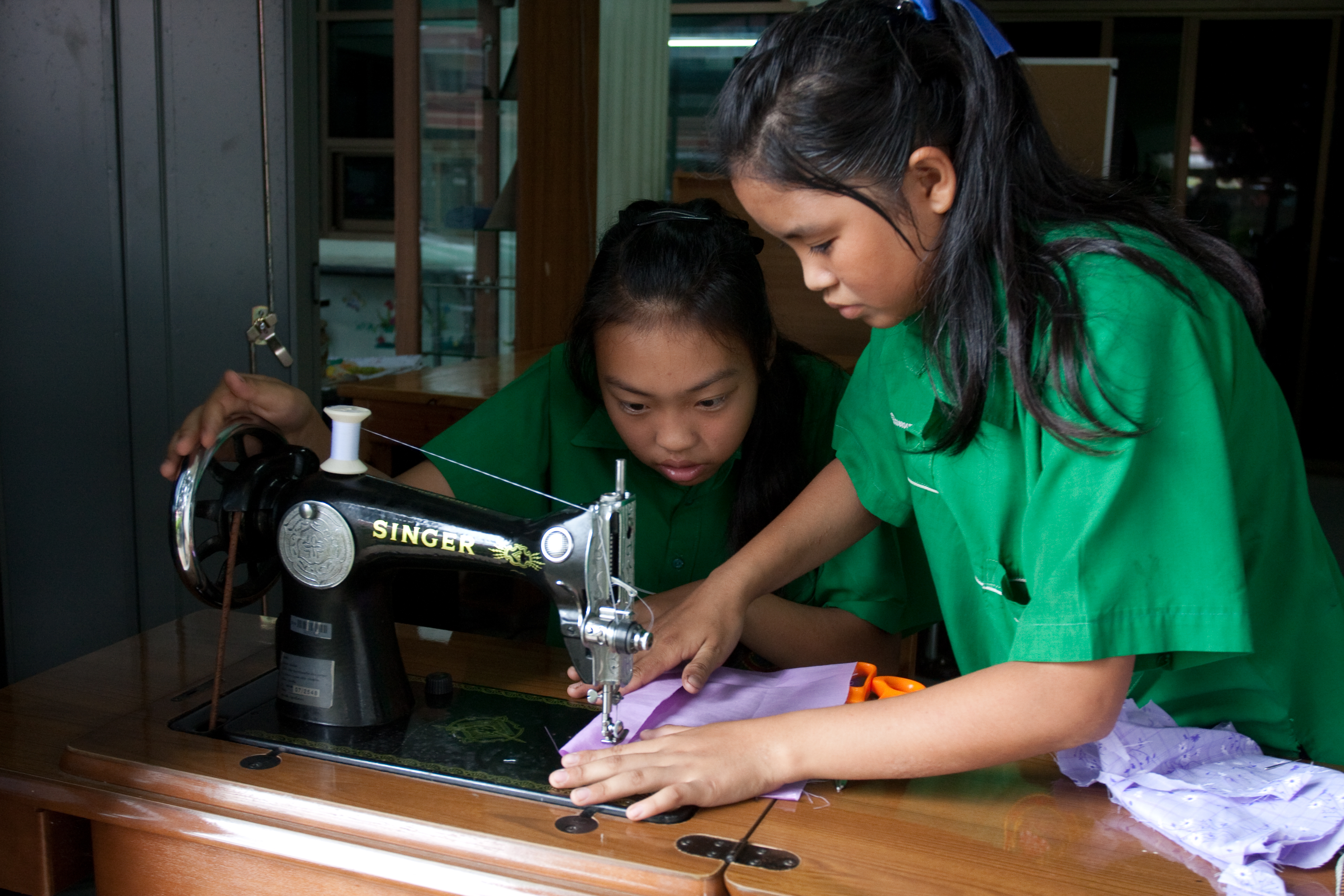 Learning to Sew in thailand