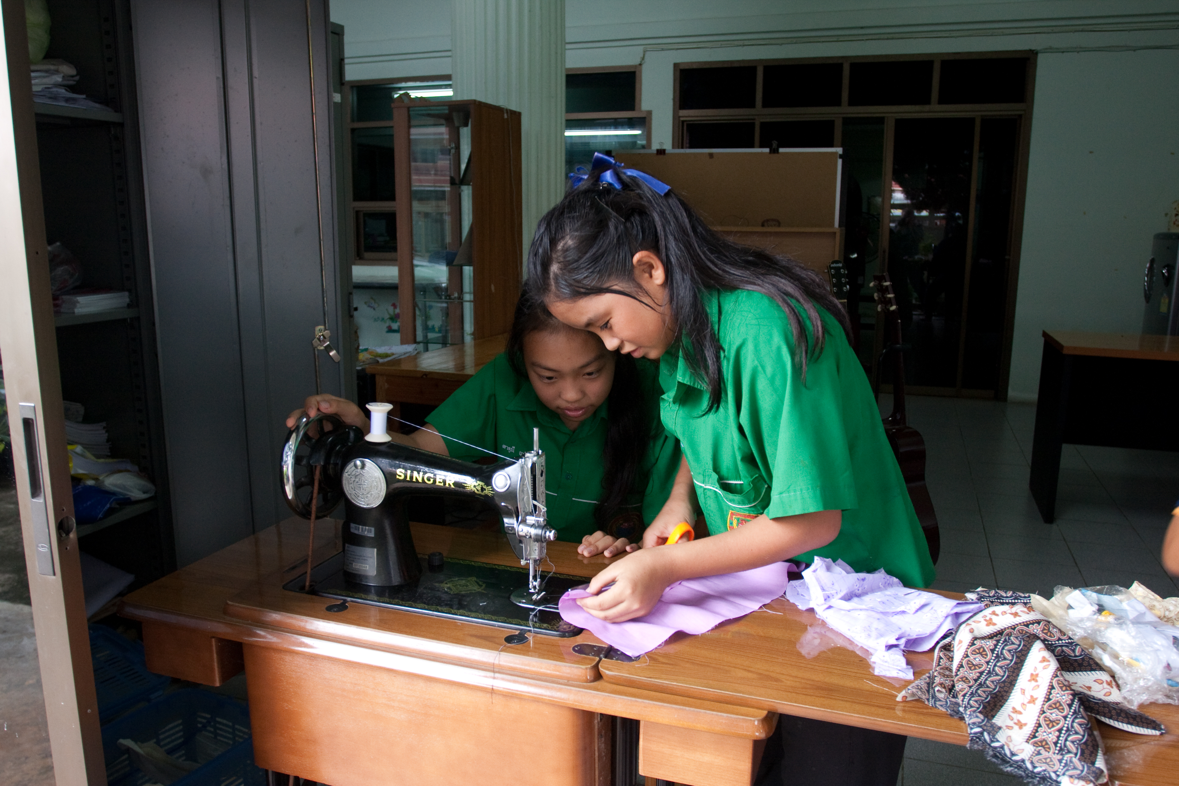 Learning to Sew in thailand