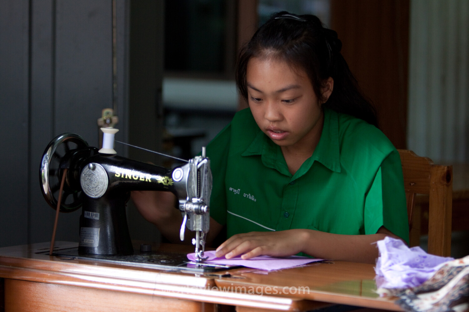 Learning to Sew in thailand