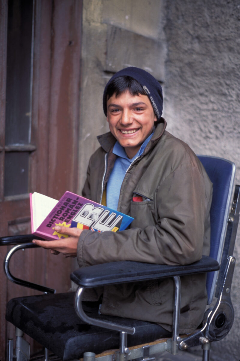 Disabled in Romania — Young boy who had legs crushed by a tank during a military crackdown on the political unrest of 1991, gets help with an ADRA program — ...