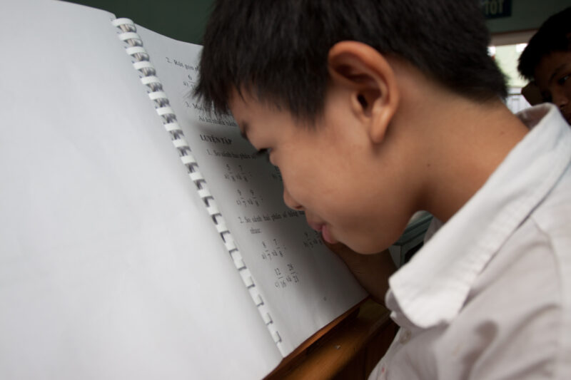 Vision Impared in Vietnam — Stock Image of child with vision impairment at a school for the blind in Vietnam. — Vietnam, children, child, children with disab...