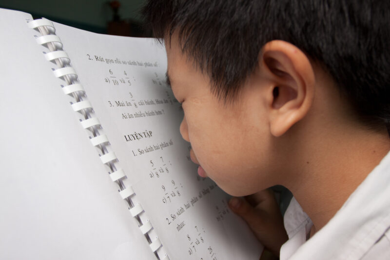 Vision Impared in Vietnam — Stock Image of child with vision impairment at a school for the blind in Vietnam. — Vietnam, children, child, children with disab...