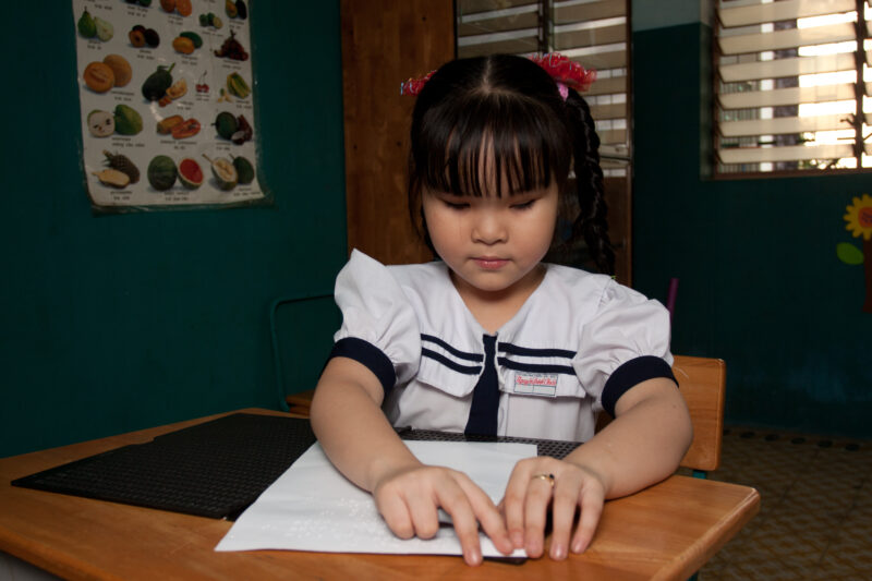 Vision Impared in Vietnam — Stock Image of child with vision impairment at a school for the blind in Vietnam. — Vietnam, children, child, children with disab...