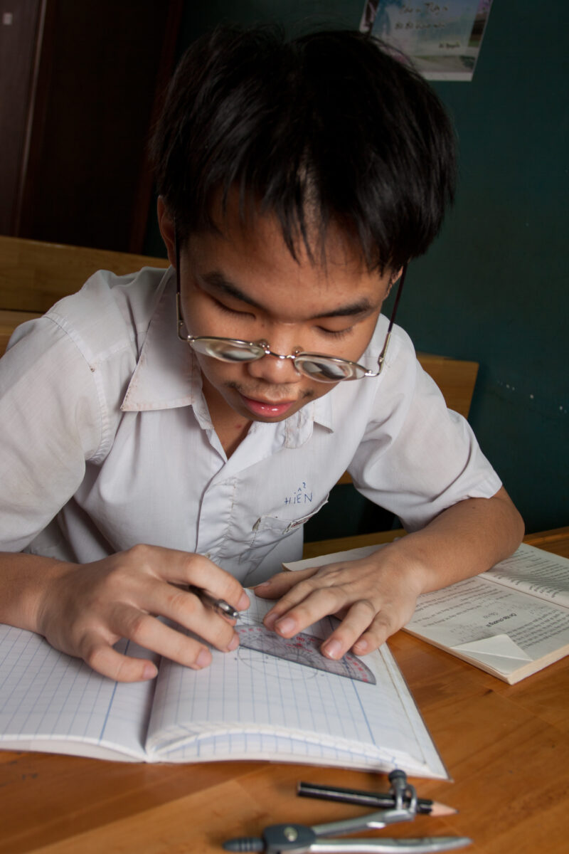 Vision Impared in Vietnam — Stock Image of child with vision impairment at a school for the blind in Vietnam. — Vietnam, children, child, children with disab...