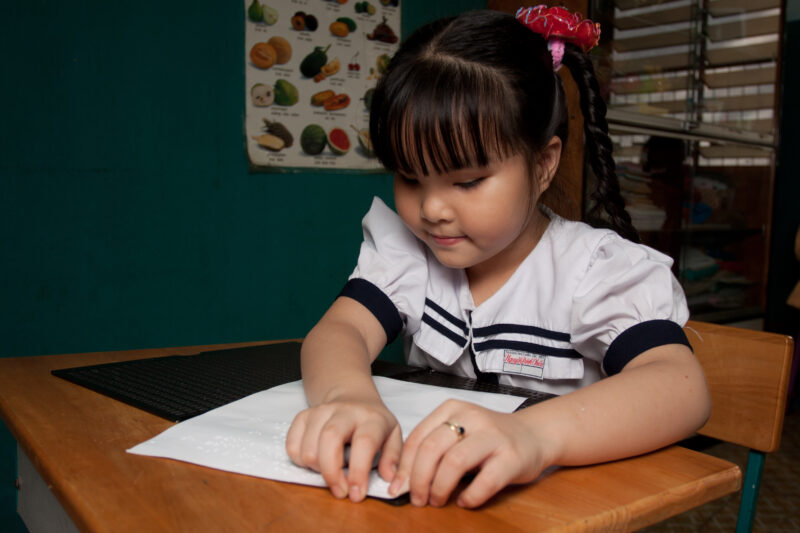 Vision Impared in Vietnam — Stock Image of child with vision impairment at a school for the blind in Vietnam. — Vietnam, children, child, children with disab...