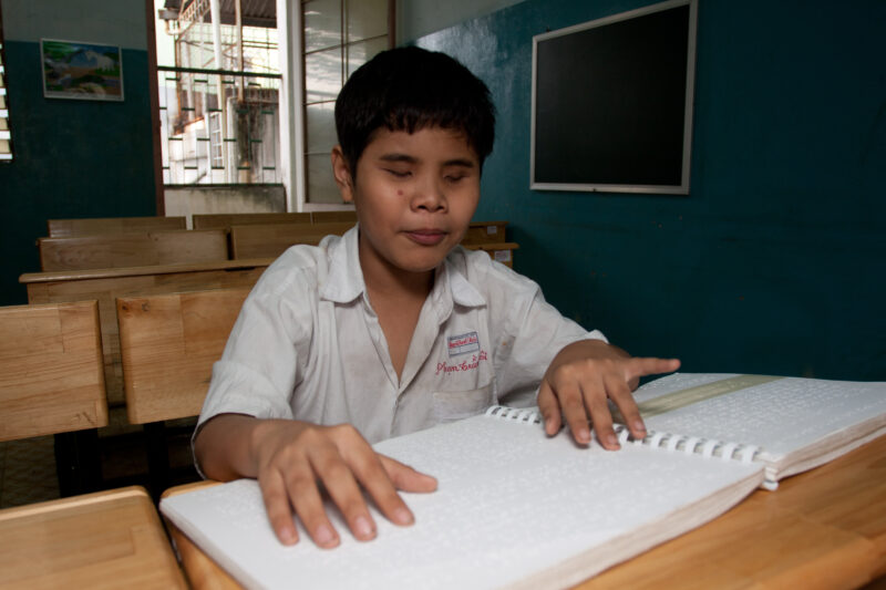 Vision Impared in Vietnam — Stock Image of child with vision impairment at a school for the blind in Vietnam. — Vietnam, children, child, children with disab...