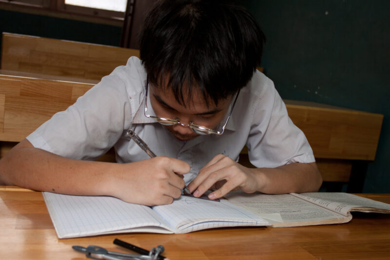 Vision Impared in Vietnam — Stock Image of child with vision impairment at a school for the blind in Vietnam. — Vietnam, children, child, children with disab...