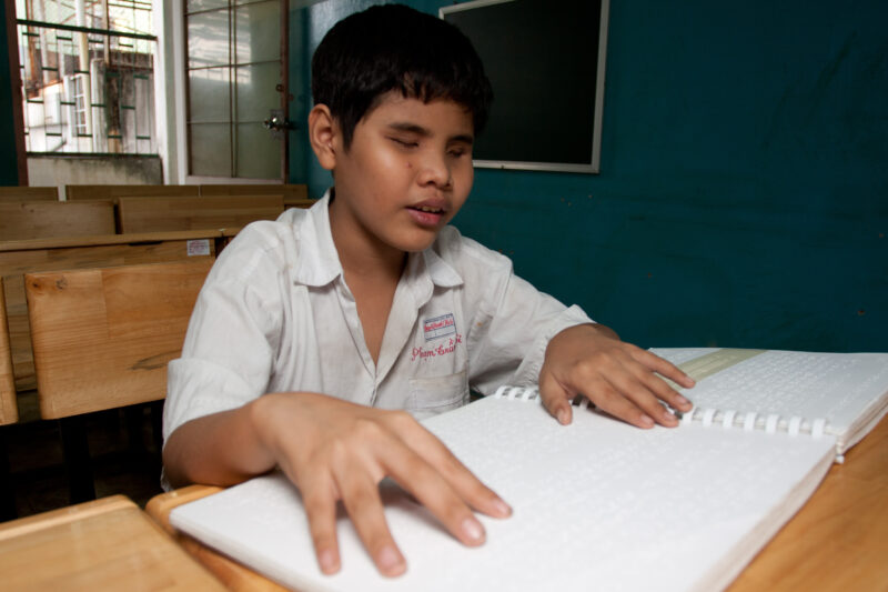 Vision Impared in Vietnam — Stock Image of child with vision impairment at a school for the blind in Vietnam. — Vietnam, children, child, children with disab...