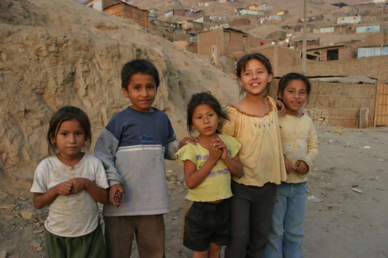 Children In Peru — Stock image of group of children living in poverty in a shantitown in Lima, Peru — ADRA, Peru, Poverty, Children, poor