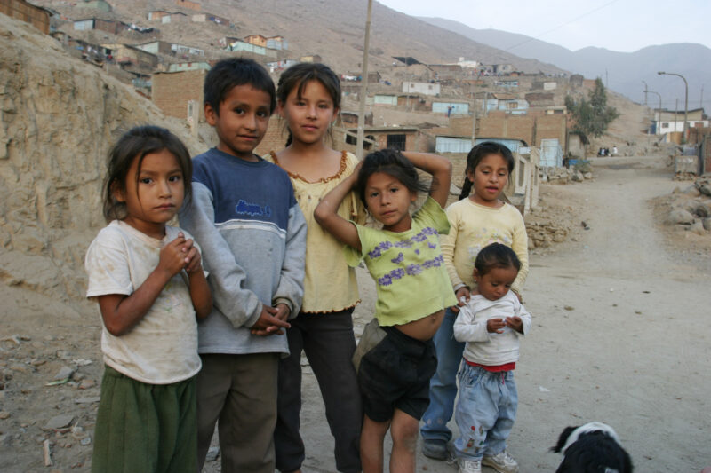 Children In Peru — Stock image of group of children living in poverty in a shantitown in Lima, Peru — ADRA, Peru, Poverty, Children, poor