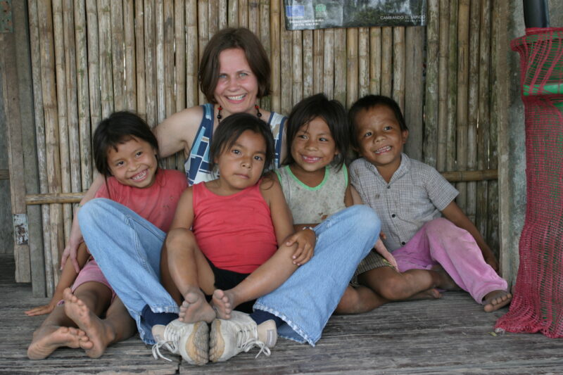 Amerindian Children in Peru — Shipibo Children pose with Pia Rierson, Director of ADRA Norway, who helped fund a number of development projects in the villag...