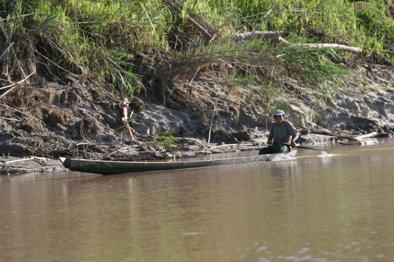 Man in Long Dugout Canoe in Peru — Ethnic Minority, Shipibo Indians, Ucayali River, Peru, Amazon