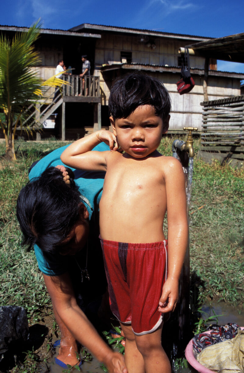 Washing Up in the Philippines — Child gets a shower at the ADRA installed water tap in the Philippines — Philippines, child, children shower, bathing, water