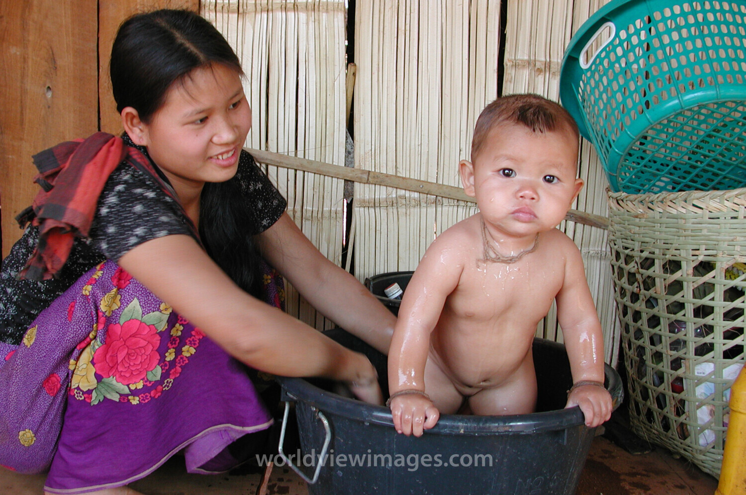 Bathing baby in Thailand