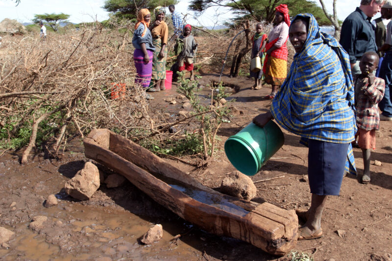 Water for animals in Africa — Using water from the new gravity fed water system to supply water for their cows in Hanang, Tanzania — Tanzania, Africa, Hanang...