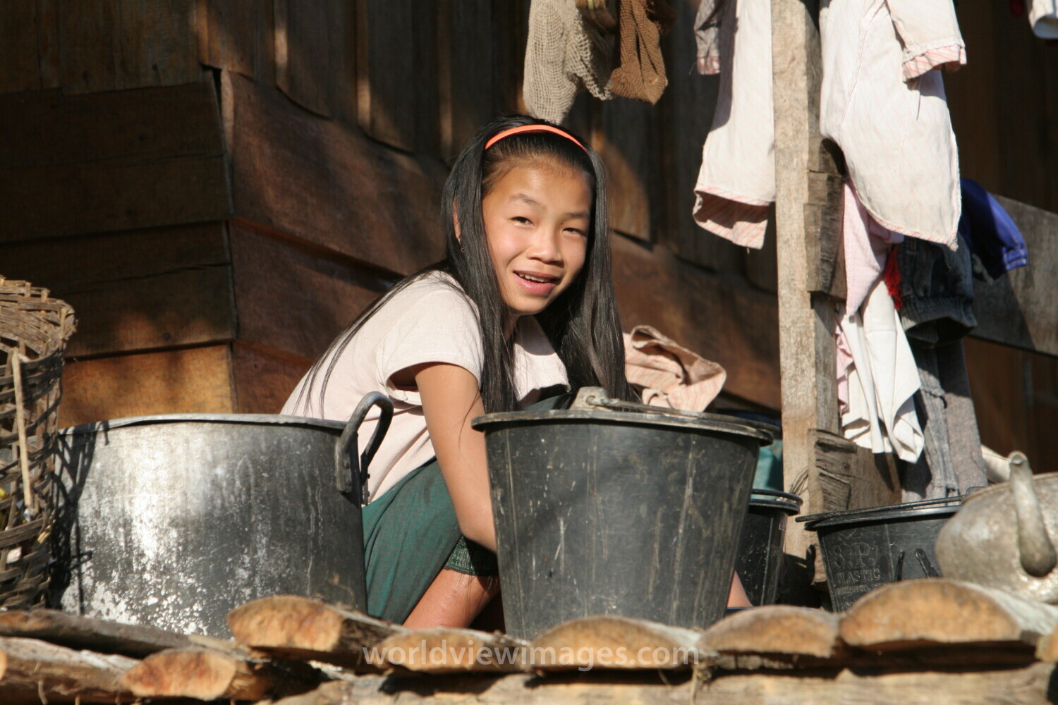 Girl with Pails in Laos