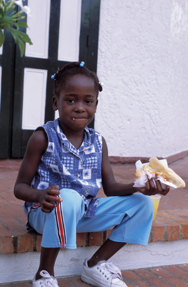 Girl Eats Sandwich in The Dominican Republic — Dominican Republic, children, girl, girls