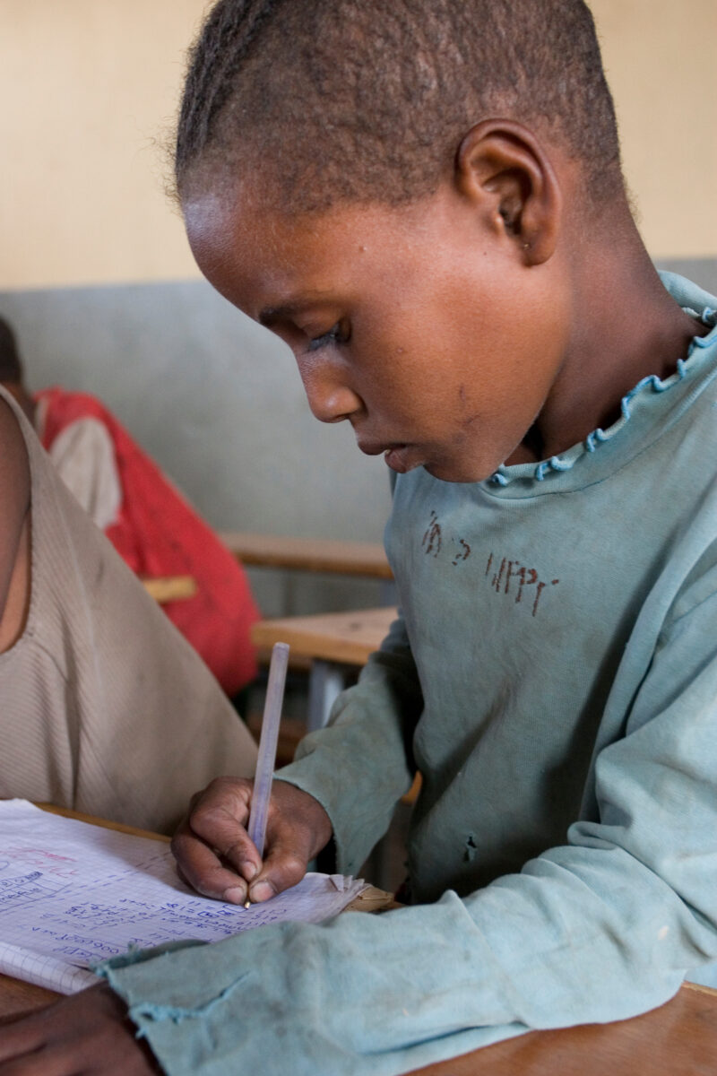Boy in School in Ethiopia — Children in a remote village in Ethiopia, enjoy their new school, provided by ADRA Norway. — Ethiopia, Africa, African, Africans,...
