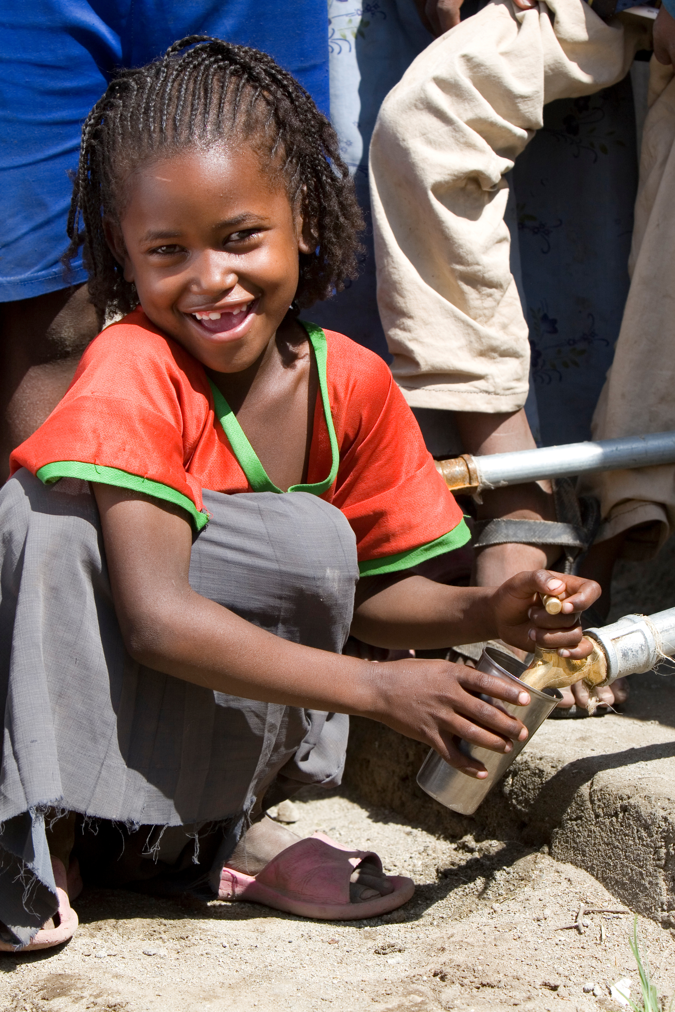 Girl Gets Drink at School