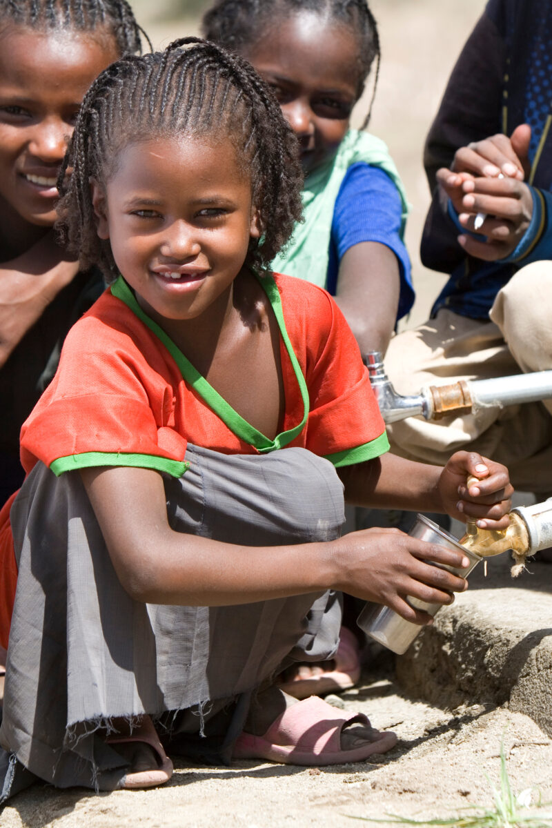 Girl Gets Drink at School — Ethiopia, Africa, African, Africans, Ethiopian