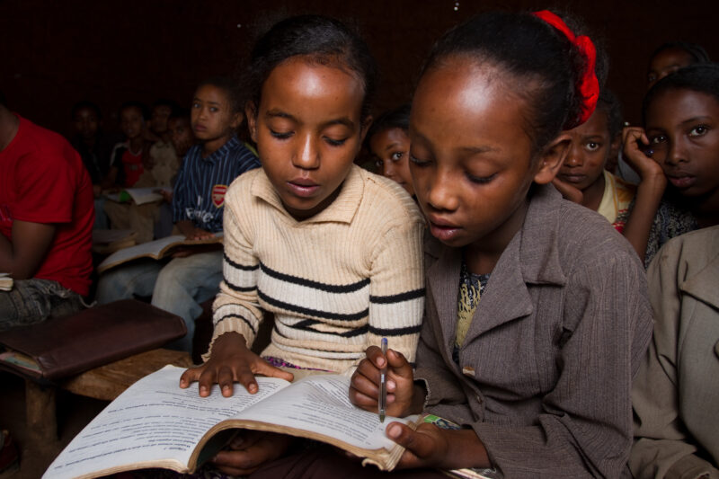 Girls in School in Ethiopia — Stock Image of girls in a school in rural Ethiopia with no desks — Ethiopia, Africa, African, Africans, Ethiopian