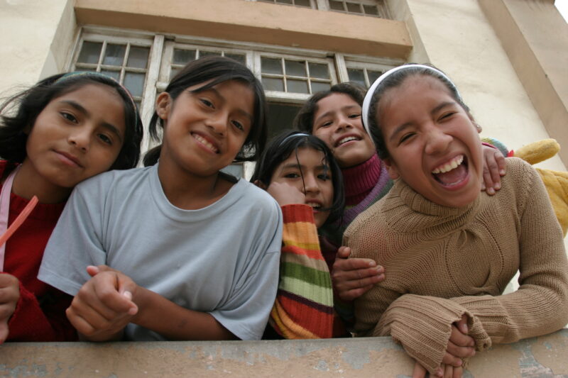Girls Living at an Orphanage in Lima, Peru — Orphan giels smile for camera in Peru — ADRA, Peru, Poverty, Children, girls
