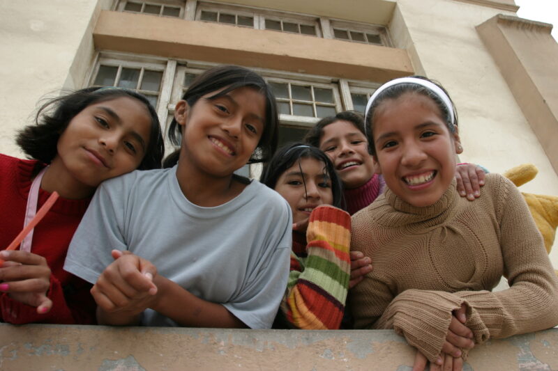 Girls Living at an Orphanage in Lima, Peru — Orphan giels smile for camera in Peru — ADRA, Peru, Poverty, Children, girls