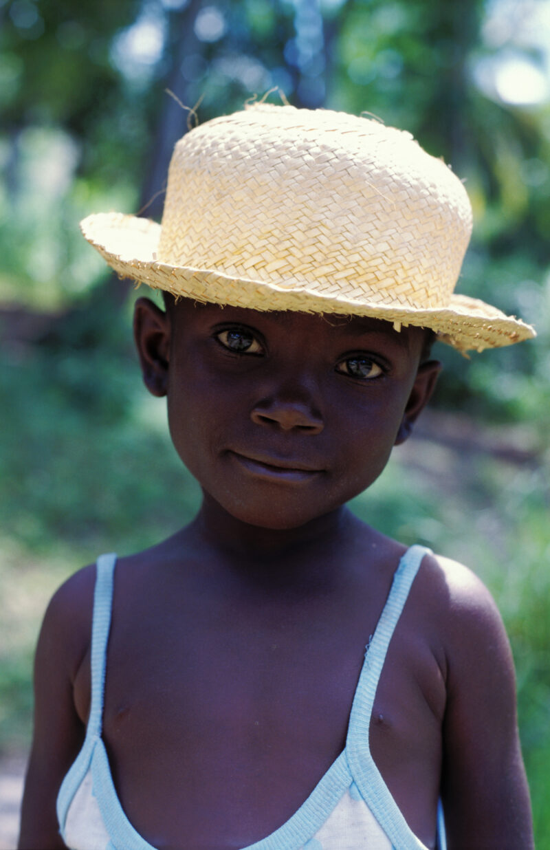 Stock Images of Haiti — Stock Image of Haiti: Boy in Haiti with a straw hat — Haiti, Haitian, boy, boys, Hat