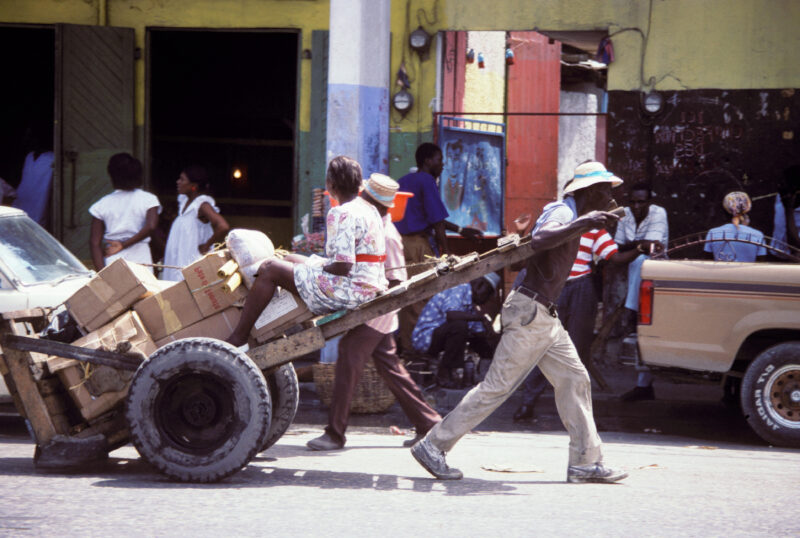 Stock Images of Haiti — Man in Haiti makes deliveries in Haiti using a cart that he pulls around. — Haiti, cart, man, people, street