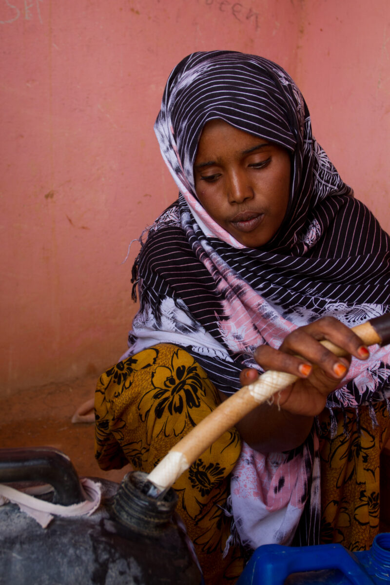 A Time of Drought in Somolia — Getting water at a bore hole during a drought in Somalia — Somolia, children, collecting water, water, bore hole