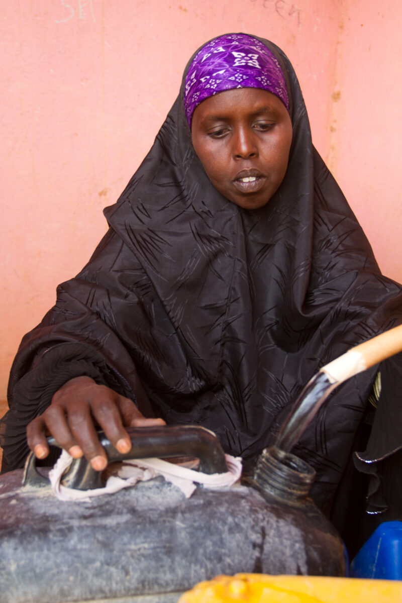 A Time of Drought in Somolia — Getting water at a bore hole during a drought in Somalia — Somolia, children, collecting water, water, bore hole