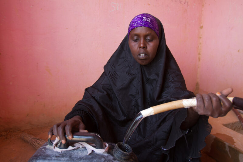 A Time of Drought in Somolia — Getting water at a bore hole during a drought in Somalia — Somolia, children, collecting water, water, bore hole