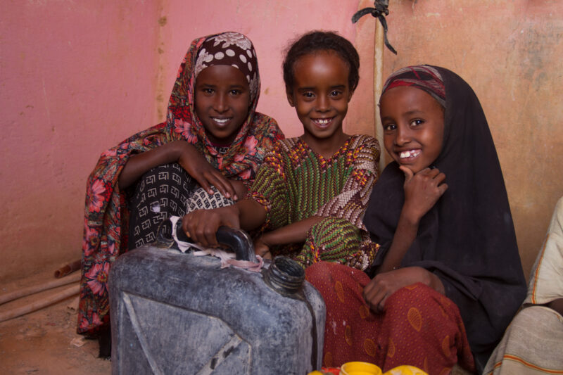 A Time of Drought in Somolia — Getting water at a bore hole during a drought in Somalia — Somolia, children, collecting water, water, bore hole