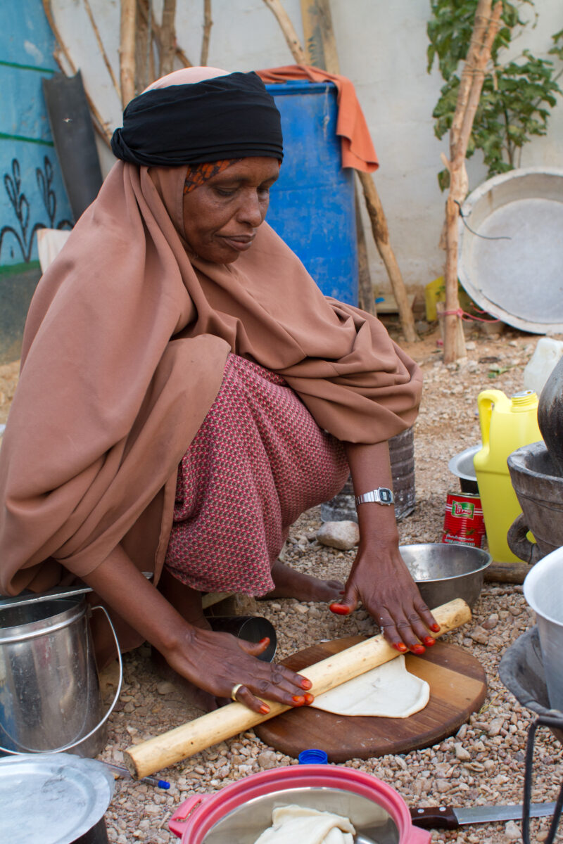 A Time of Drought in Somolia — Cooking a meal with Flour from a food distribution for IDPs — Somolia, drought, IDP, Internally Displaced