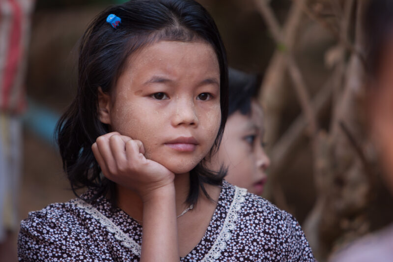 Karen Girl in A Refugee Camp — Karen people from Myanmar (Burma) have spent years in in refugee camps along the Thai/Burma border, to avoid violence from the...