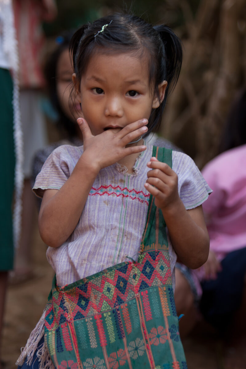 Karen Girl in A Refugee Camp — Karen people from Myanmar (Burma) have spent years in in refugee camps along the Thai/Burma border, to avoid violence from the...