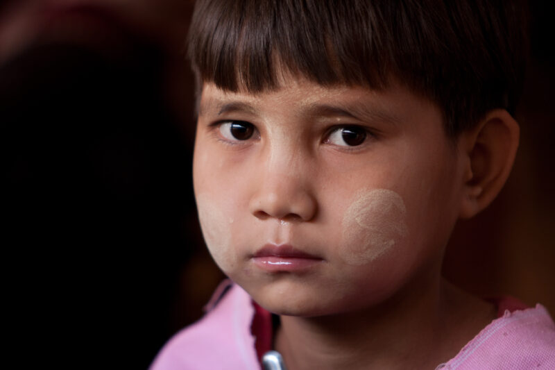 Karen Girl in A Refugee Camp — Karen people from Myanmar (Burma) have spent years in in refugee camps along the Thai/Burma border, to avoid violence from the...