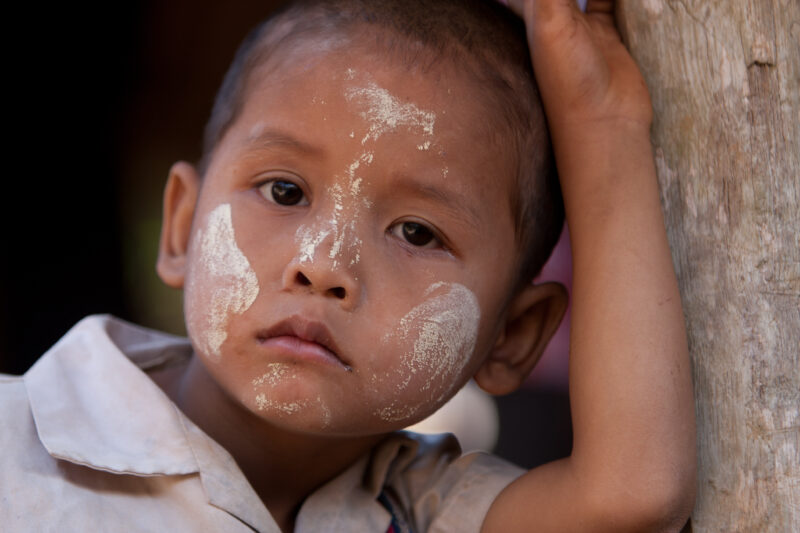 Karen boy in a Refugee Camp — Karen people from Myanmar (Burma) have spent years in in refugee camps along the Thai/Burma border, to avoid violence from the ...