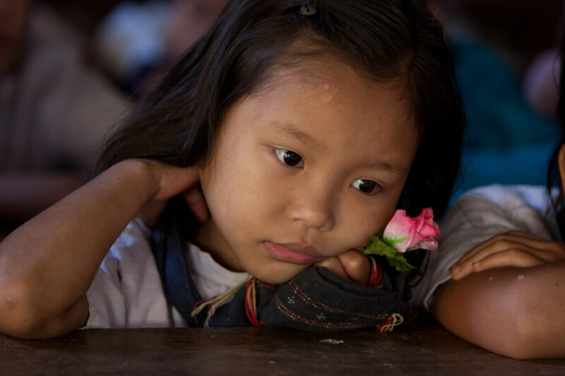 Karen Girl in A Refugee Camp — Karen people from Myanmar (Burma) have spent years in in refugee camps along the Thai/Burma border, to avoid violence from the...