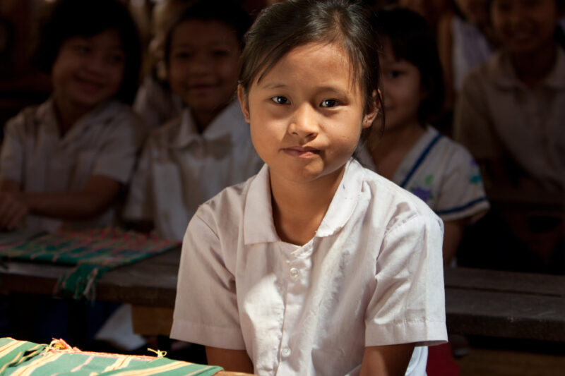 Karen Girl in A Refugee Camp — Karen people from Myanmar (Burma) have spent years in in refugee camps along the Thai/Burma border, to avoid violence from the...