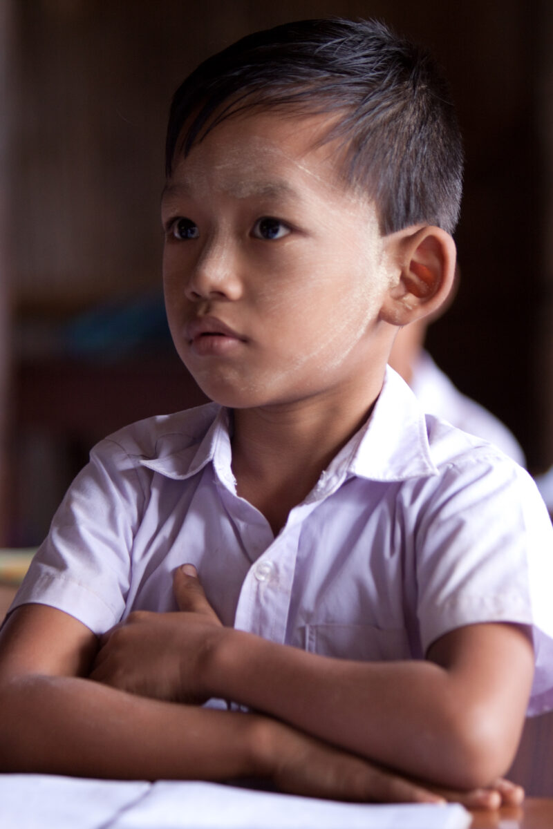 Student in a Refugee Camp — Karen people from Myanmar (Burma) have spent years in in refugee camps along the Thai/Burma border, to avoid violence from the mi...