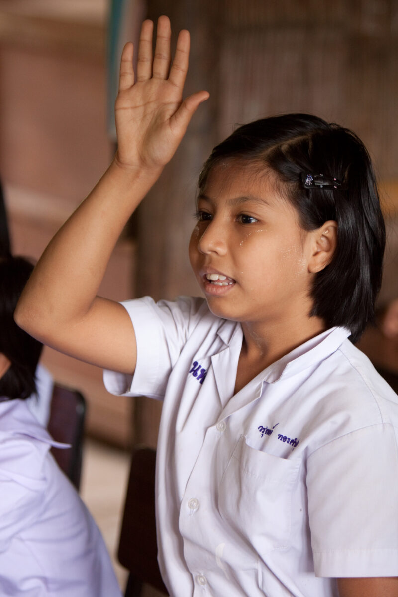 Student in a Refugee Camp — Karen people from Myanmar (Burma) have spent years in in refugee camps along the Thai/Burma border, to avoid violence from the mi...