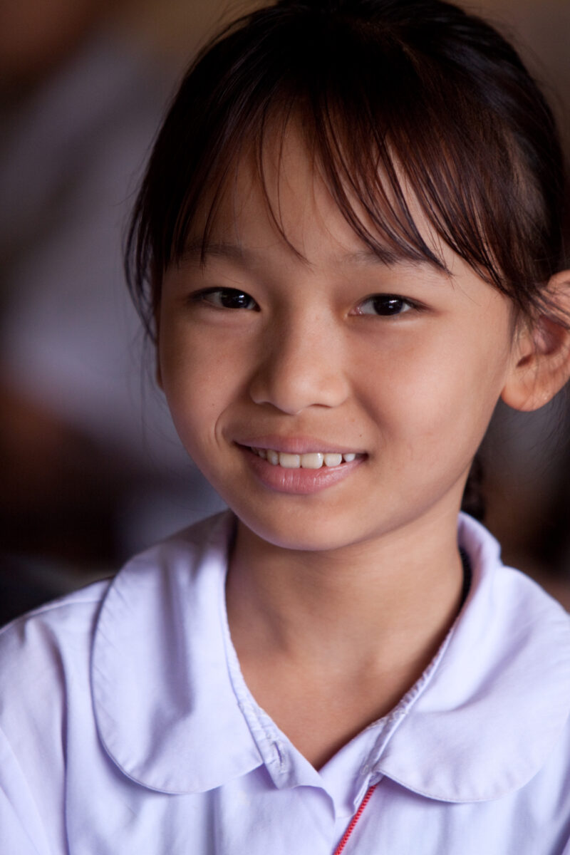 Student in a Refugee Camp — Karen people from Myanmar (Burma) have spent years in in refugee camps along the Thai/Burma border, to avoid violence from the mi...