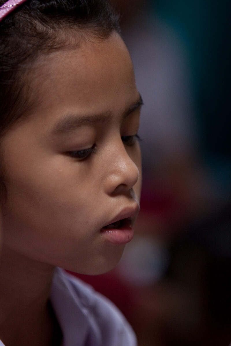 Student in a Refugee Camp — Karen people from Myanmar (Burma) have spent years in in refugee camps along the Thai/Burma border, to avoid violence from the mi...