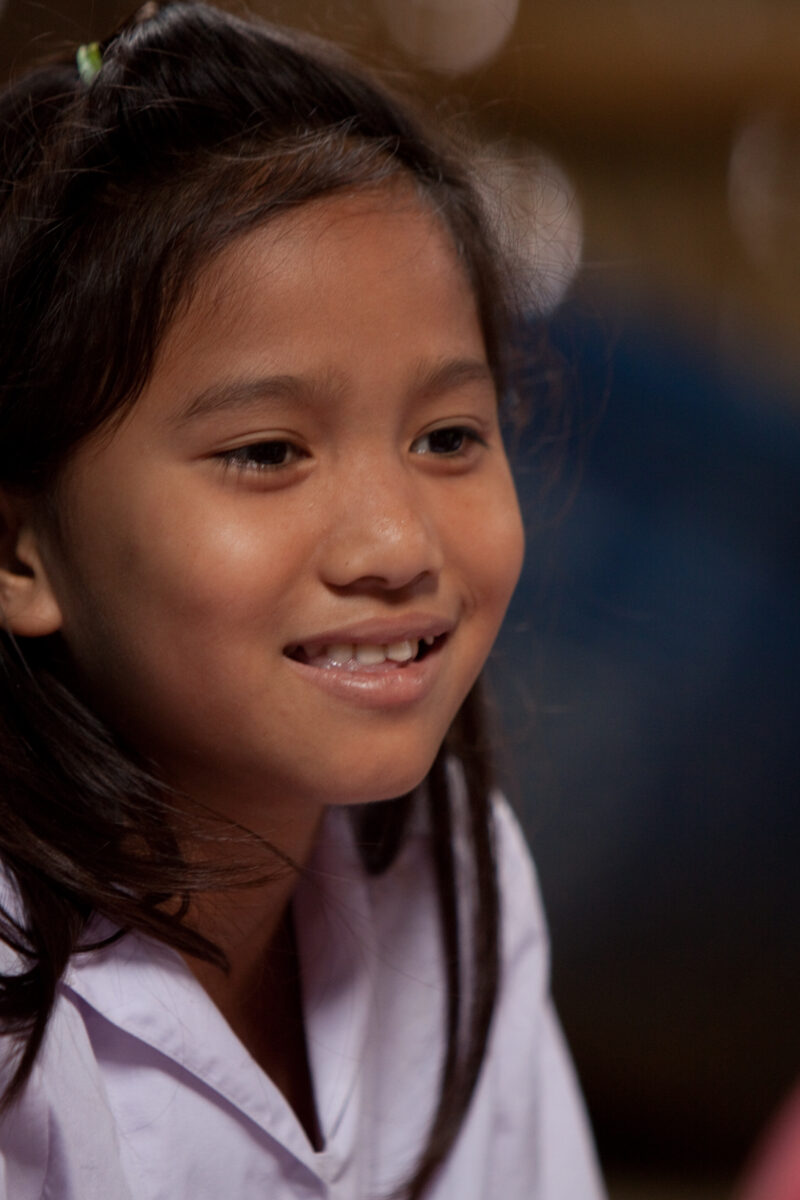 Student in a Refugee Camp — Karen people from Myanmar (Burma) have spent years in in refugee camps along the Thai/Burma border, to avoid violence from the mi...